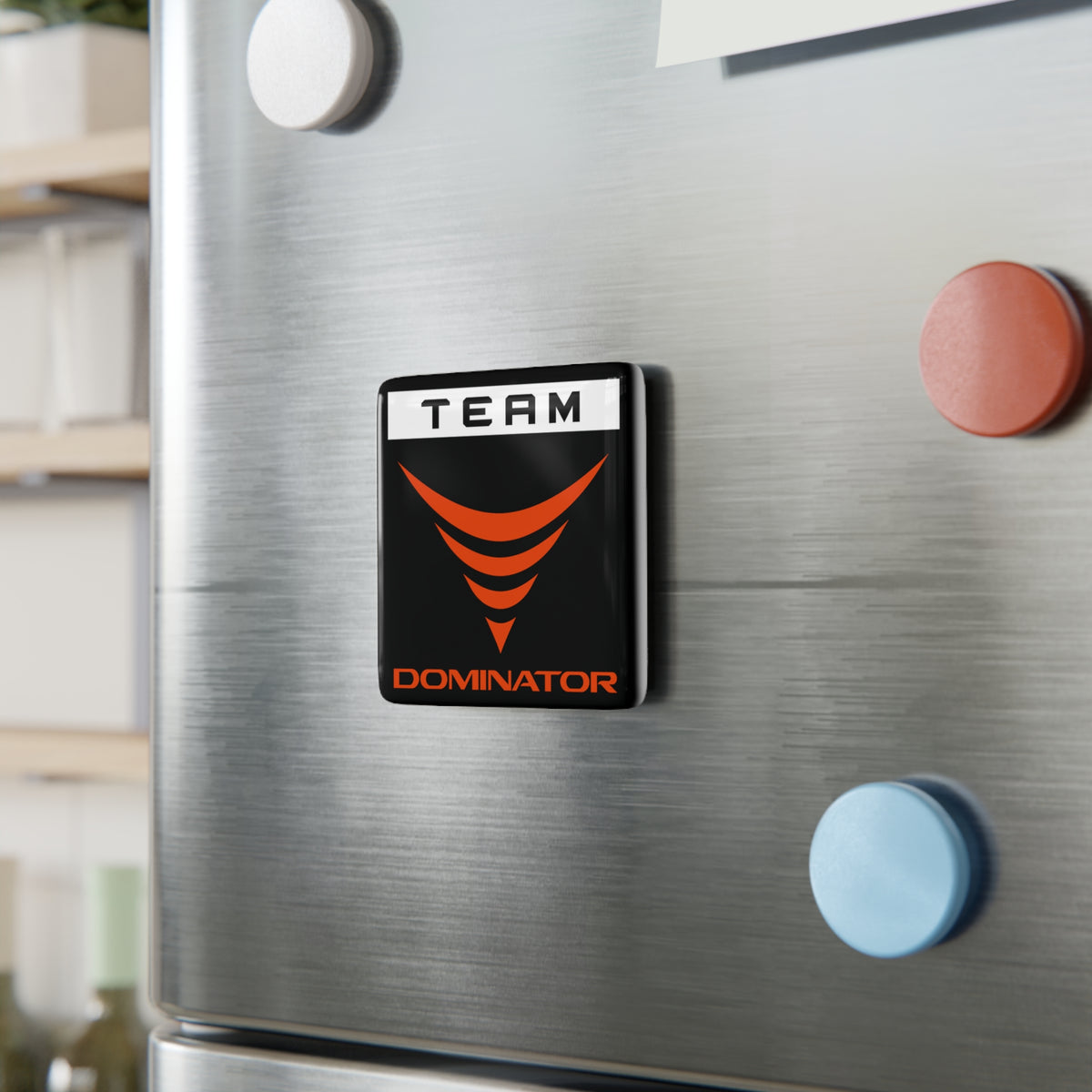 TEAM DOMINATOR PORCELAIN MAGNET - Never Stop Chasing